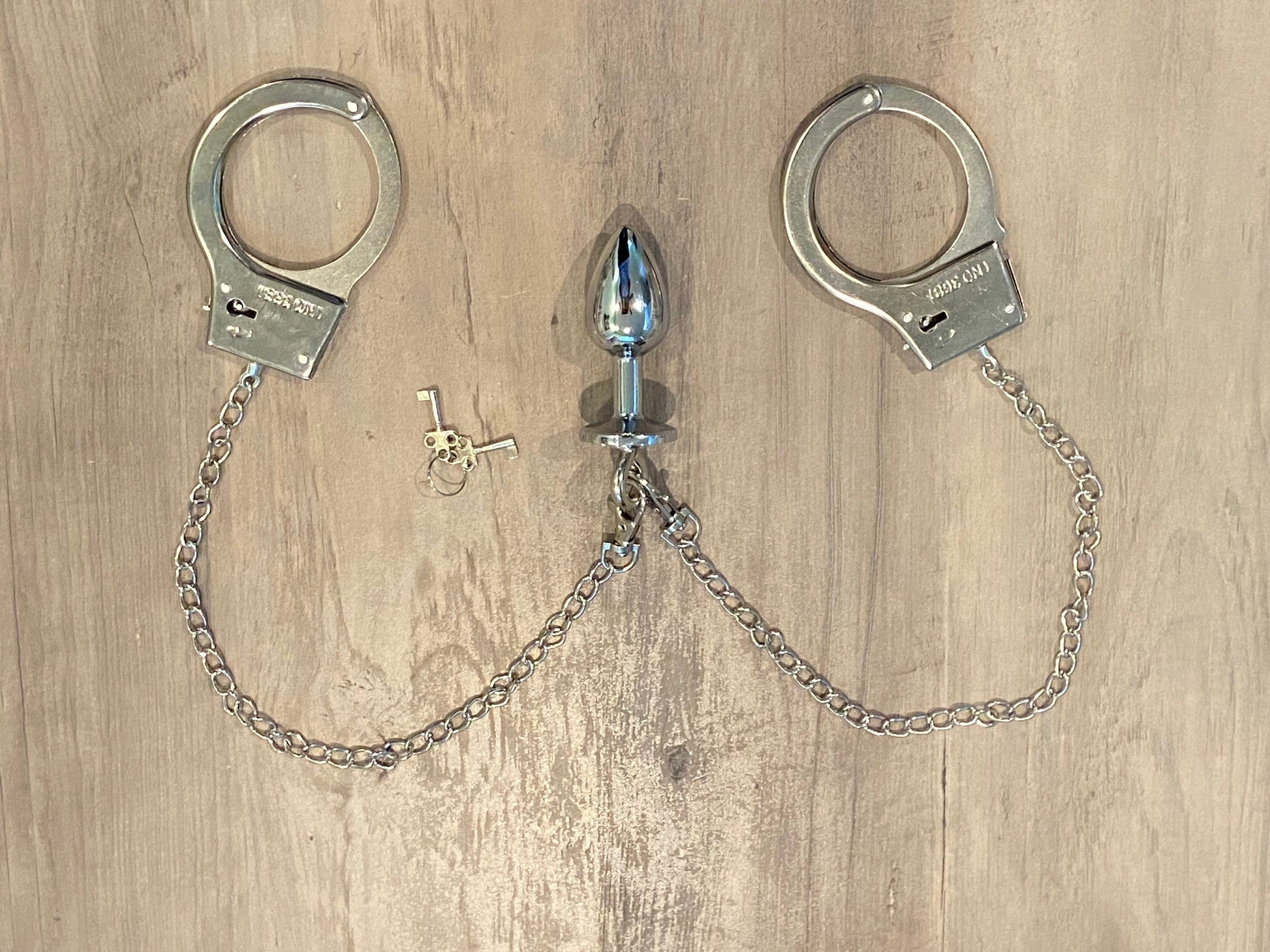 Handcuff Butt Plug Combination Set Plug Emporium Handcuff Butt Plug Combination Set Plug Emporium